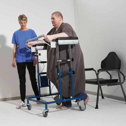 A man using a bariatric walking frame