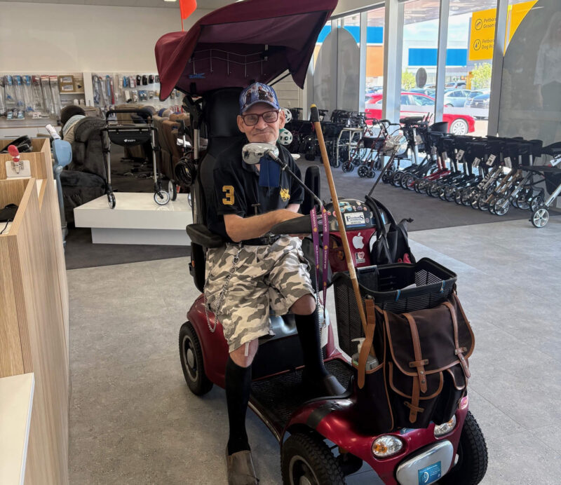 Michael visits the Belmont showroom on his scooter